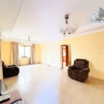 Semi-furnished compact villa exterior in a Juffair compound with common pool and small patio