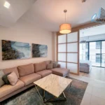 Fully furnished studio apartment for rent in Reef Island with balcony and turnkey amenities