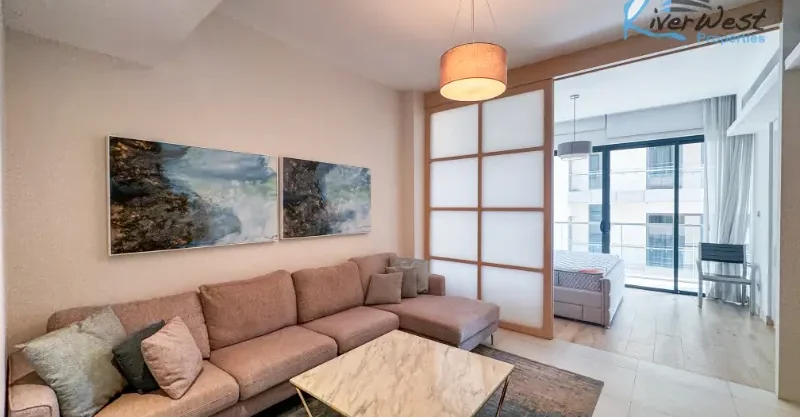 Fully furnished studio apartment for rent in Reef Island with balcony and turnkey amenities